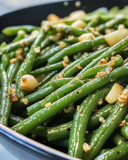 ‘Green Bean Bliss’—just 5 ingredients, but the garlicky butter makes these green beans a holiday must-have!